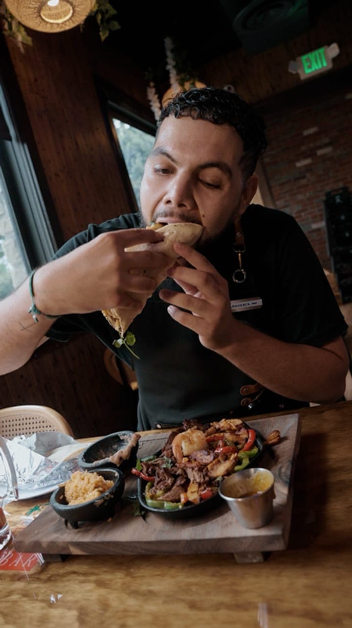 Digging into the fajitas mixtas